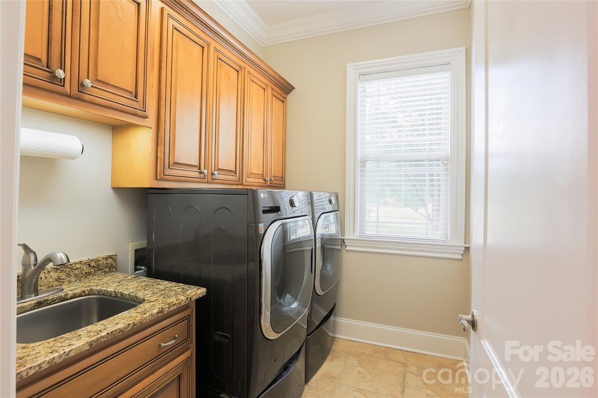Your private sanctuary awaits in this custom-built brick and - photo 27