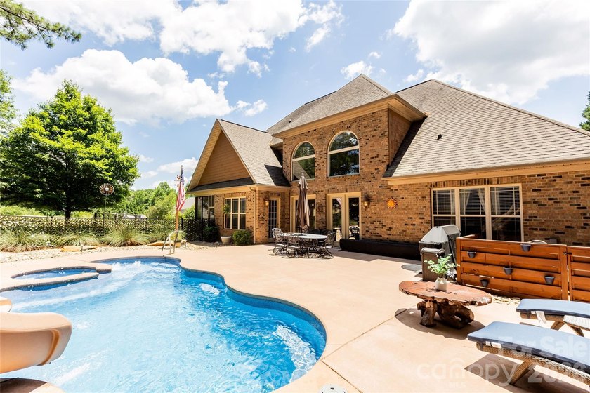 Your private sanctuary awaits in this custom-built brick and - photo 41