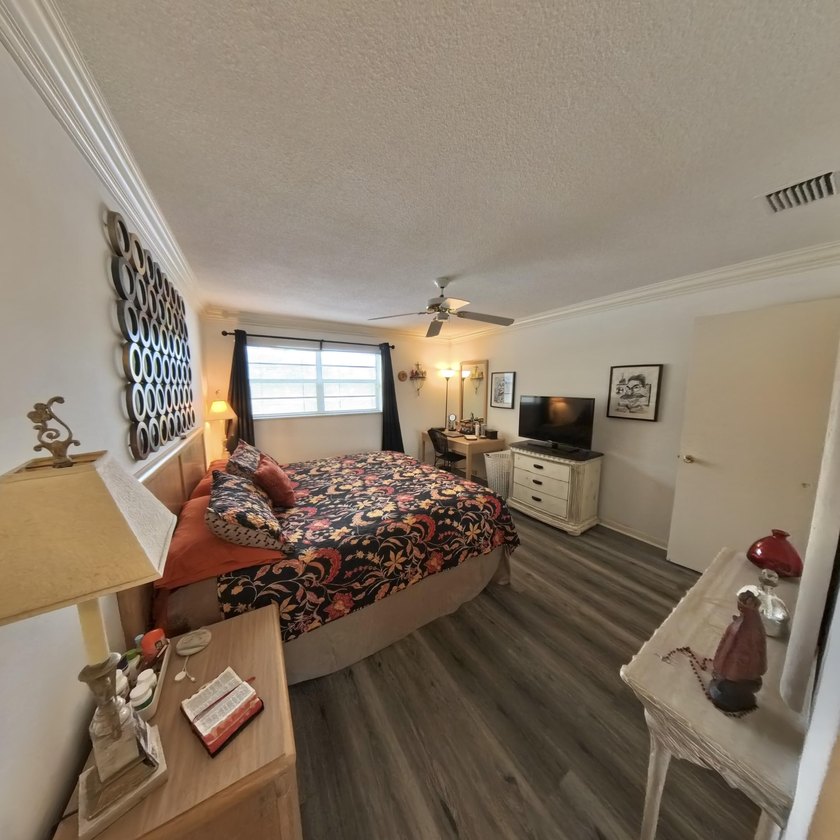 Step inside to find a spacious 2 bedroom condo featuring - photo 13