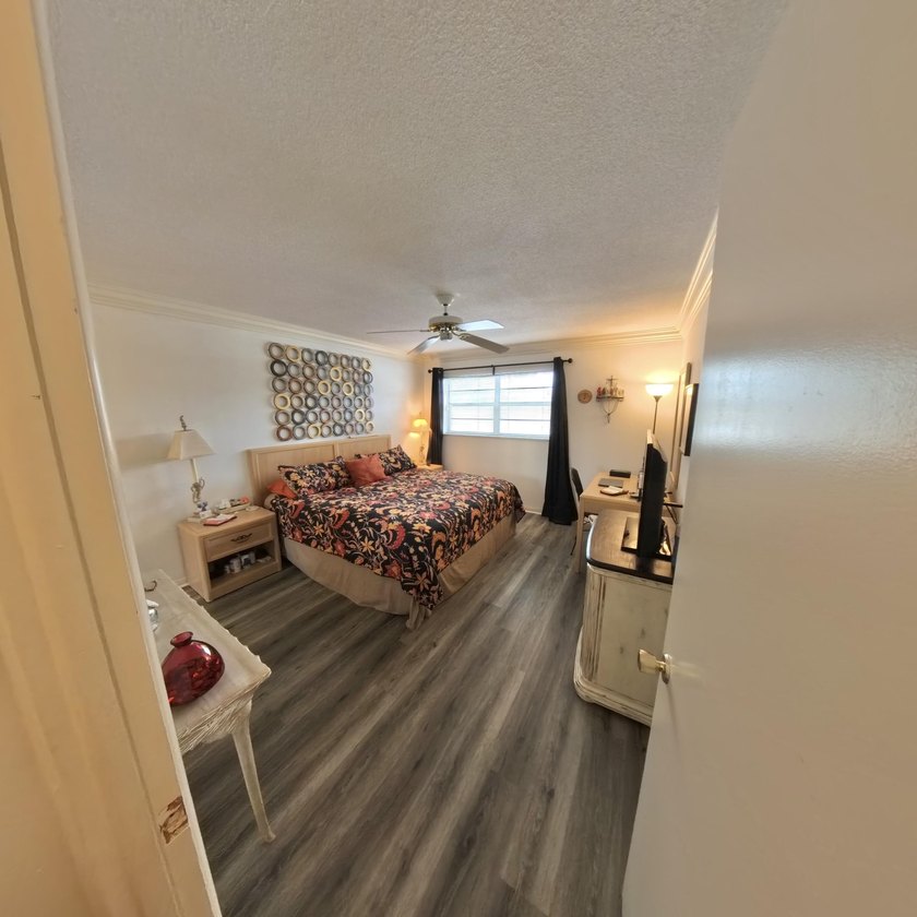 Step inside to find a spacious 2 bedroom condo featuring - photo 14