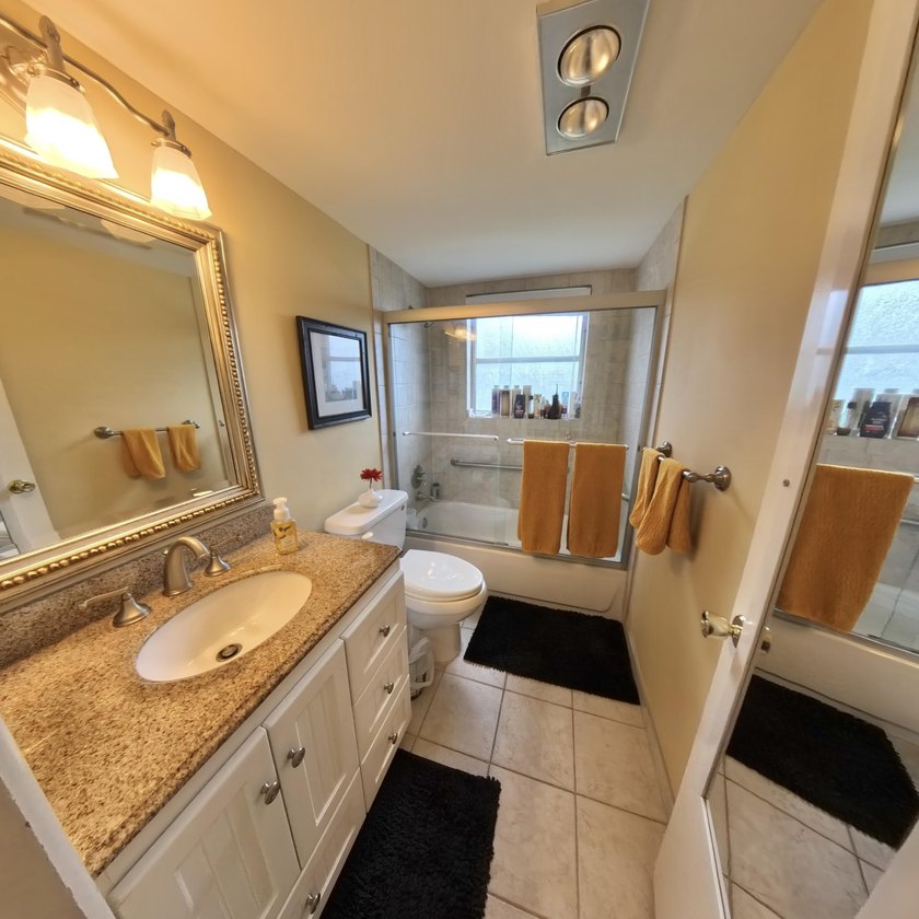 Step inside to find a spacious 2 bedroom condo featuring - photo 18