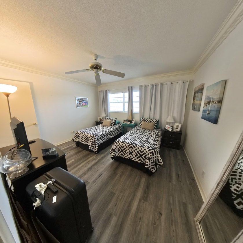 Step inside to find a spacious 2 bedroom condo featuring - photo 19