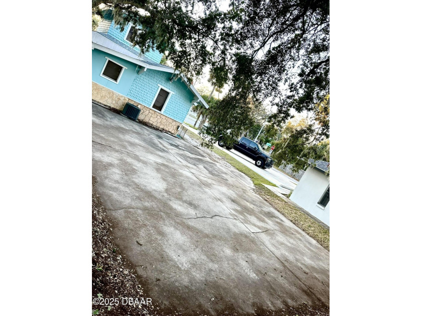 *Property Type:** Three-bedroom, two-bath house/commercial - photo 3