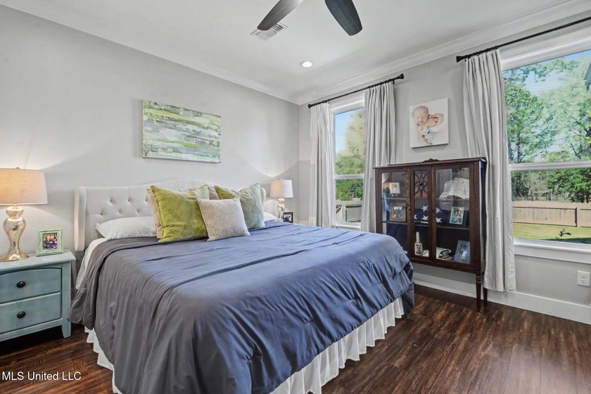 Modern farmhouse elegance meets Gulf Coast living. Step into one - photo 16