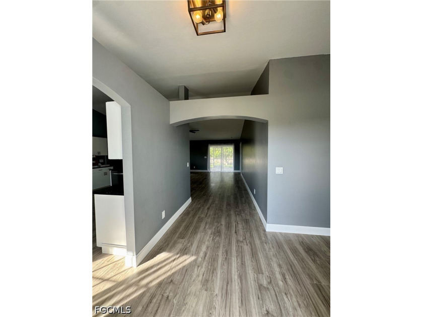 COME CHECK OUT THIS BEAUTIFULLY UPDATED home located in the - photo 2