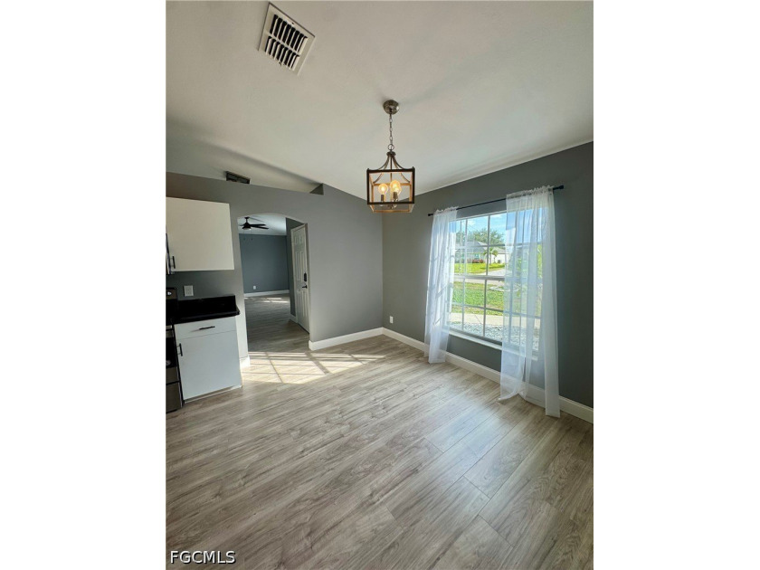 COME CHECK OUT THIS BEAUTIFULLY UPDATED home located in the - photo 3