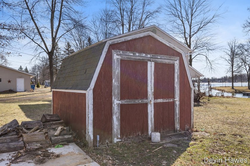 Tucked along 64 feet of private channel frontage with direct - photo 26