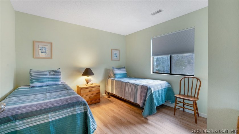 Affordable &amp; Updated 2-Bed, 2-Bath Condo with 12x32 Boat Slip on - photo 12