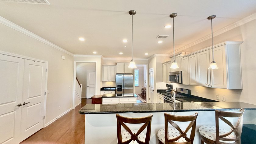 Experience classic Lowcountry living in this freshly-repainted - photo 10