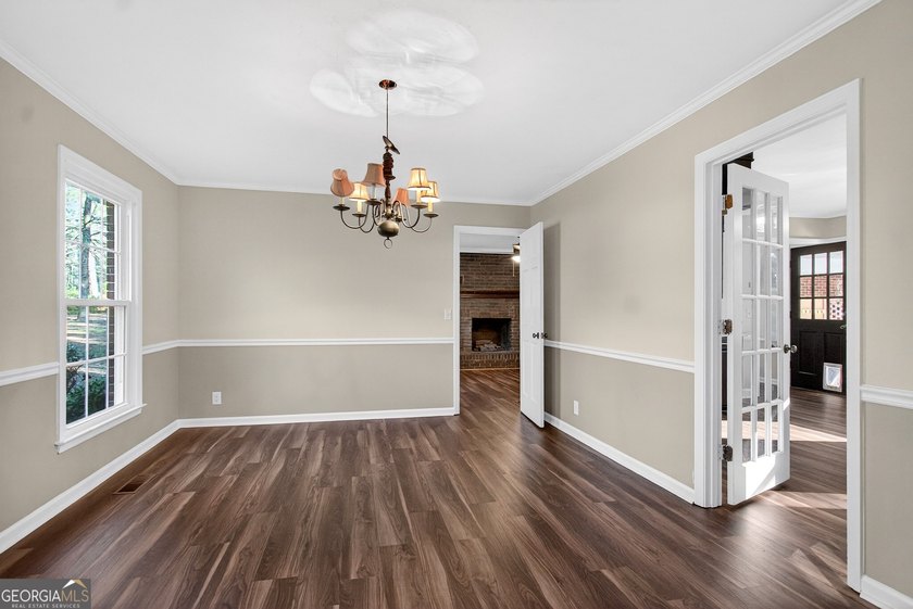 Spacious living with incredible entertaining features in a - photo 6