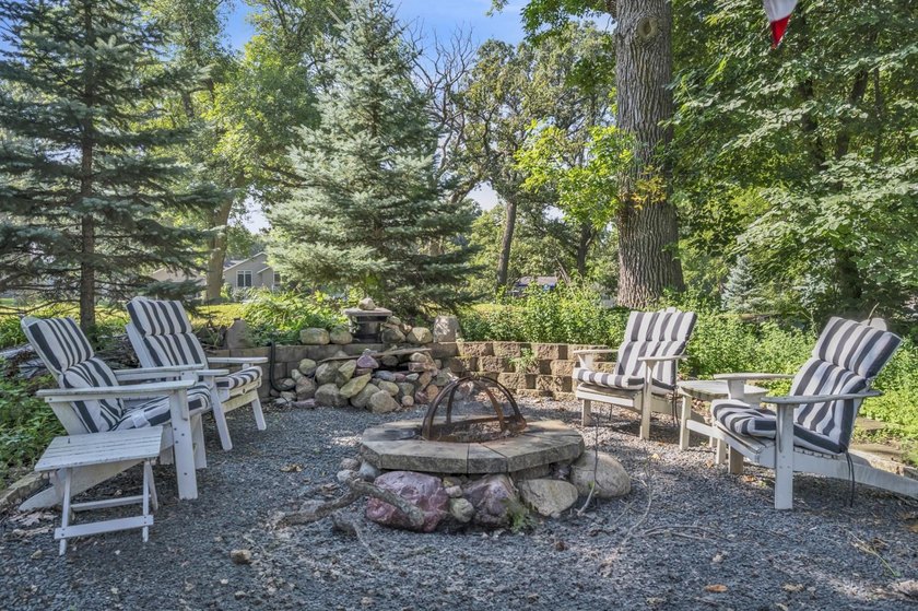 Just off East Okoboji Lake, nestled in the trees sits a - photo 41