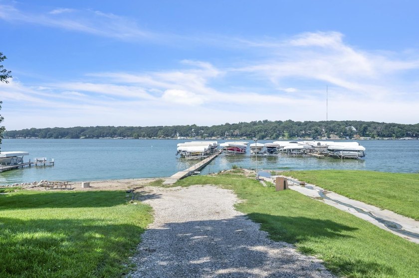 Just off East Okoboji Lake, nestled in the trees sits a - photo 44
