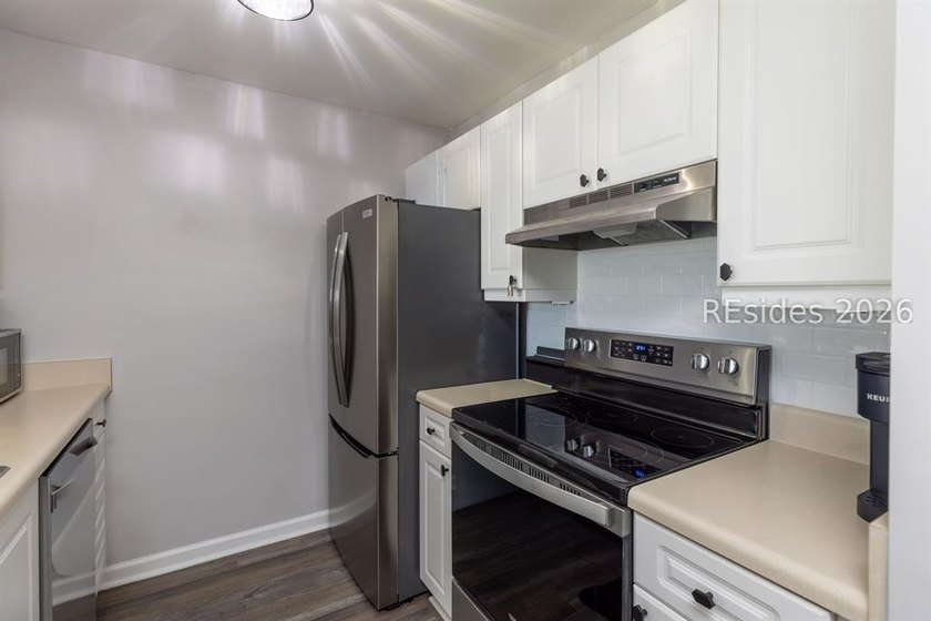 You'll LOVE this villa! Loaded with new improvements. New A/C - photo 6