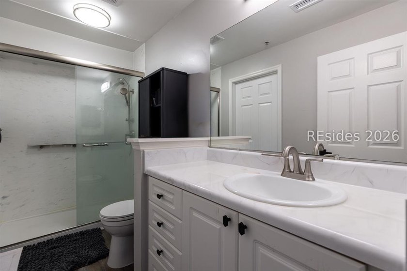 You'll LOVE this villa! Loaded with new improvements. New A/C - photo 10
