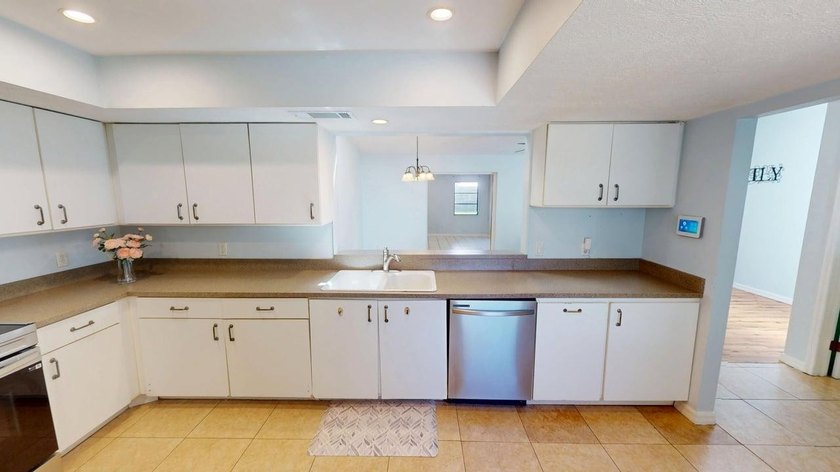 Welcome to this charming single-story residence located in Port - photo 13
