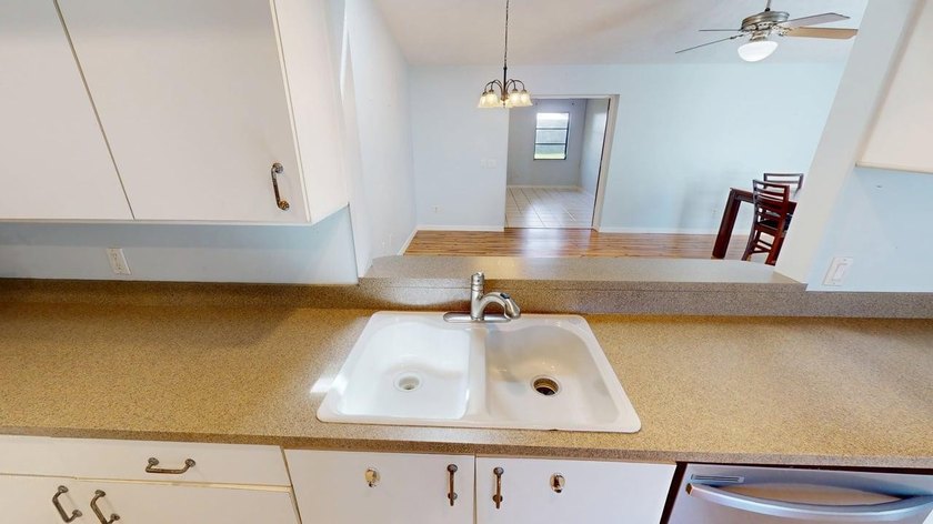 Welcome to this charming single-story residence located in Port - photo 14