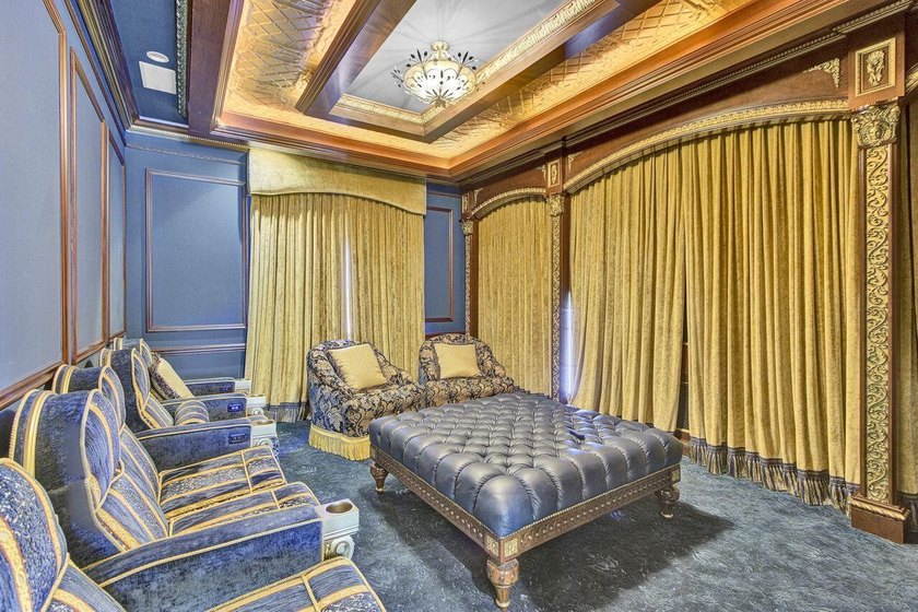 Commanding serene lakefront and double fairway vistas, this - photo 22