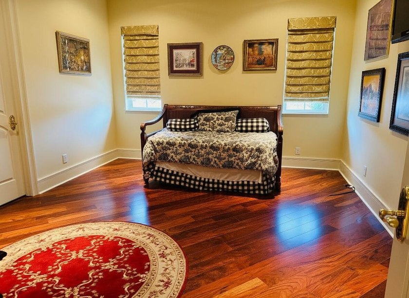 Commanding serene lakefront and double fairway vistas, this - photo 26