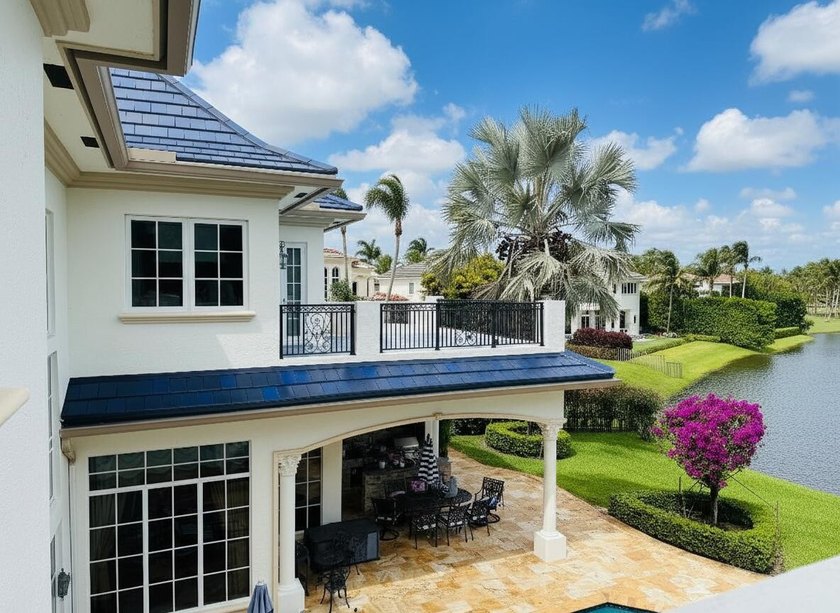 Commanding serene lakefront and double fairway vistas, this - photo 28