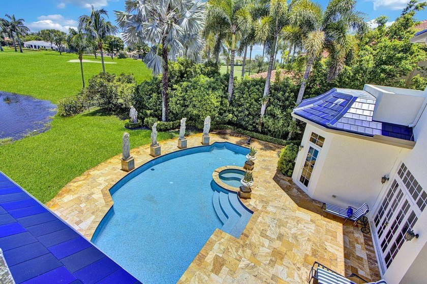 Commanding serene lakefront and double fairway vistas, this - photo 30
