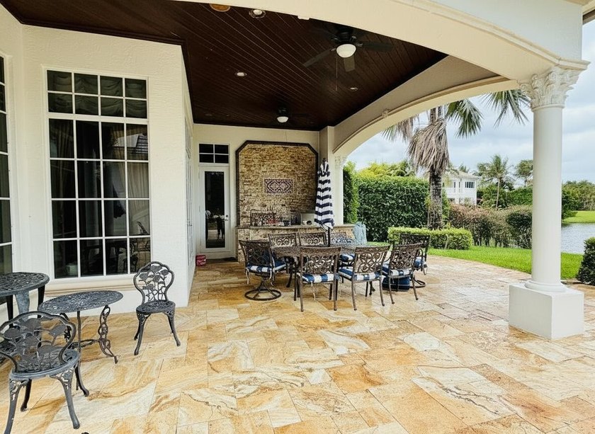 Commanding serene lakefront and double fairway vistas, this - photo 33