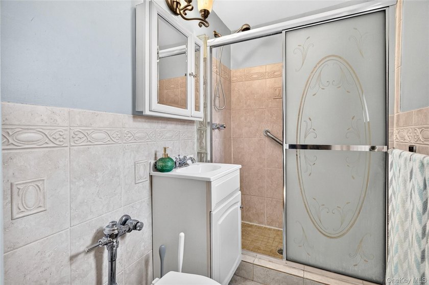 Let this unit sweep you off your feet! True three-bedroom, two - photo 35