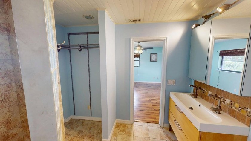 Welcome to this charming single-story residence located in Port - photo 37