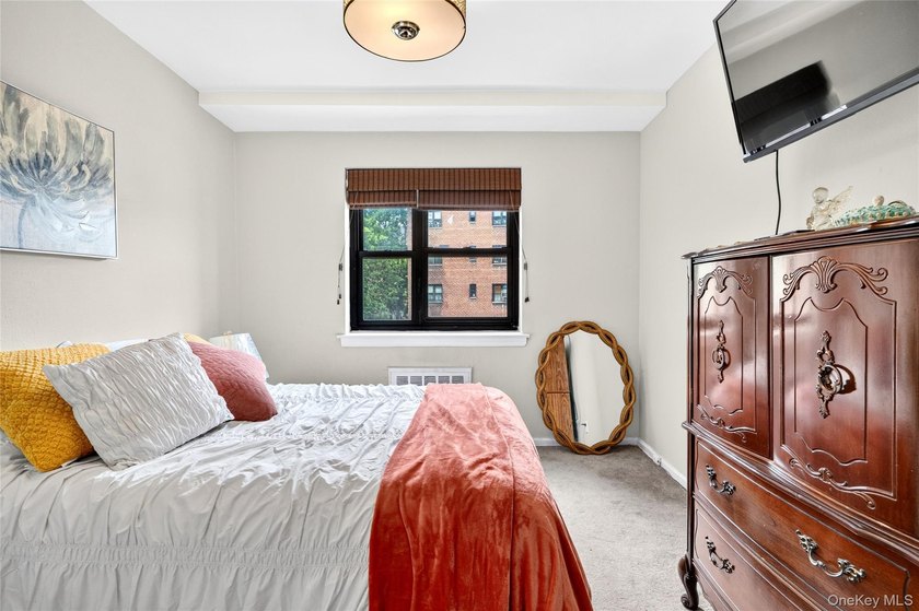 Let this unit sweep you off your feet! True three-bedroom, two - photo 38
