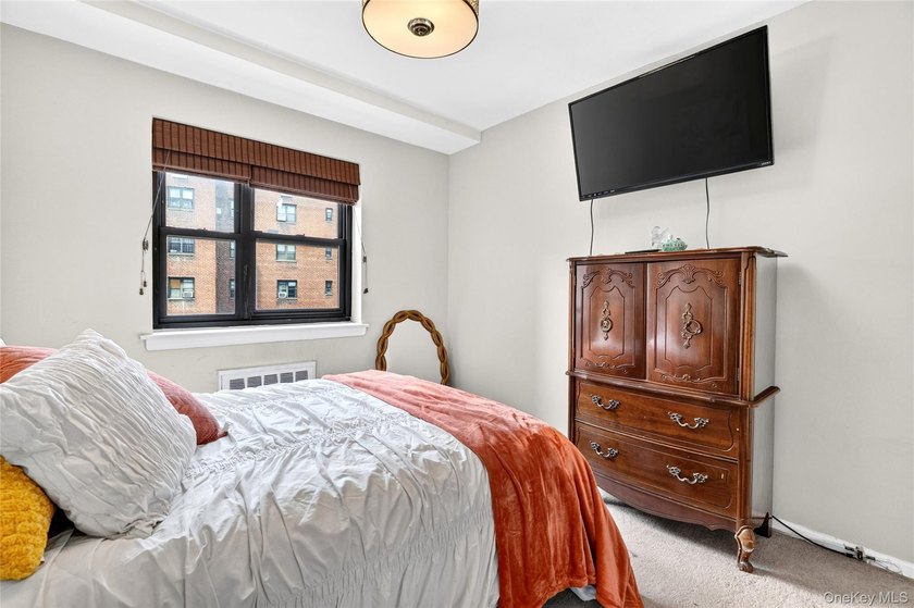Let this unit sweep you off your feet! True three-bedroom, two - photo 39