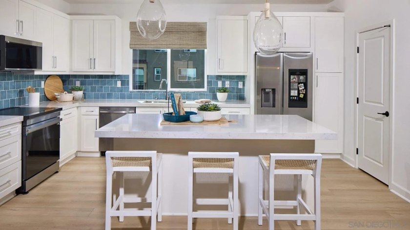 This home is a former model with an upgraded backsplash and - photo 3
