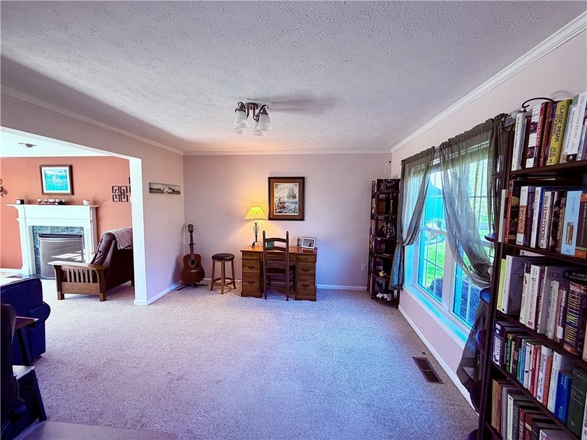 Spacious 4-bedroom, 2.5-bath home featuring a dramatic 2-story - photo 17