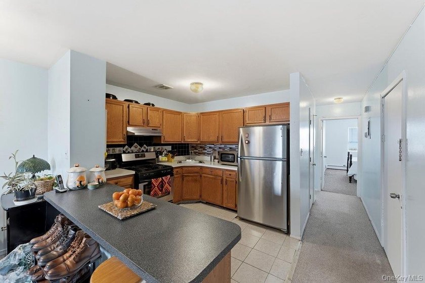 Welcome to 129-15 Sidway Place! A well-maintained attached brick - photo 19
