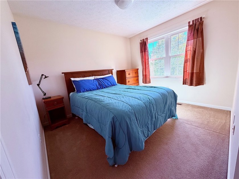 Spacious 4-bedroom, 2.5-bath home featuring a dramatic 2-story - photo 21