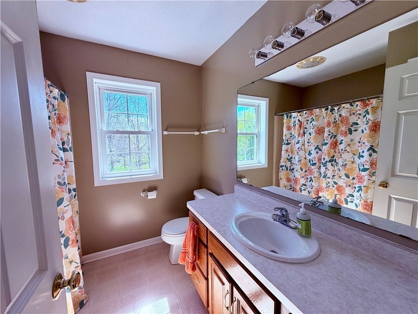 Spacious 4-bedroom, 2.5-bath home featuring a dramatic 2-story - photo 23