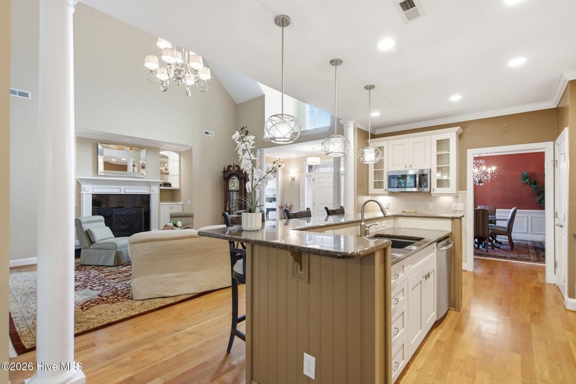 Welcome to 2118 Bay Colony Lane, an elegant 1.5-story brick - photo 12