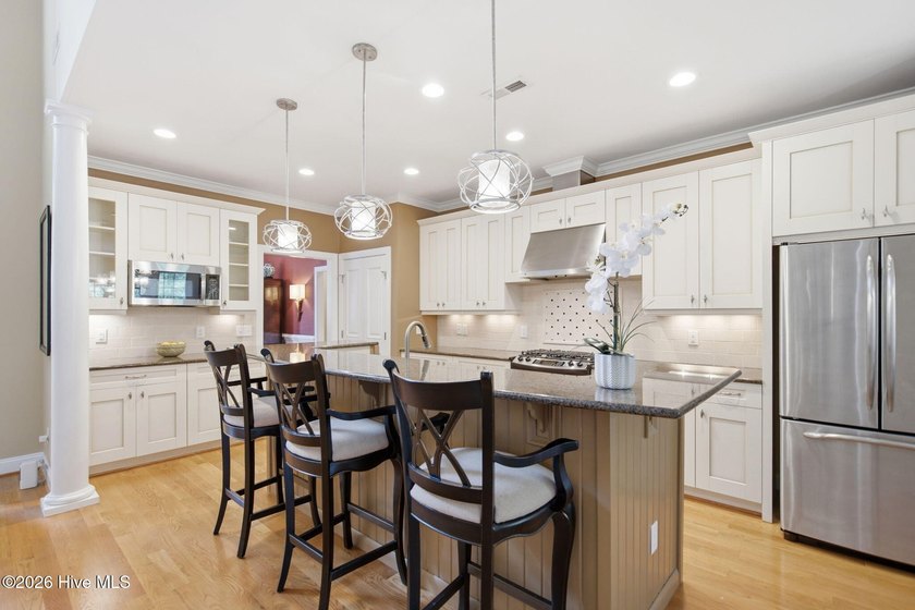 Welcome to 2118 Bay Colony Lane, an elegant 1.5-story brick - photo 13