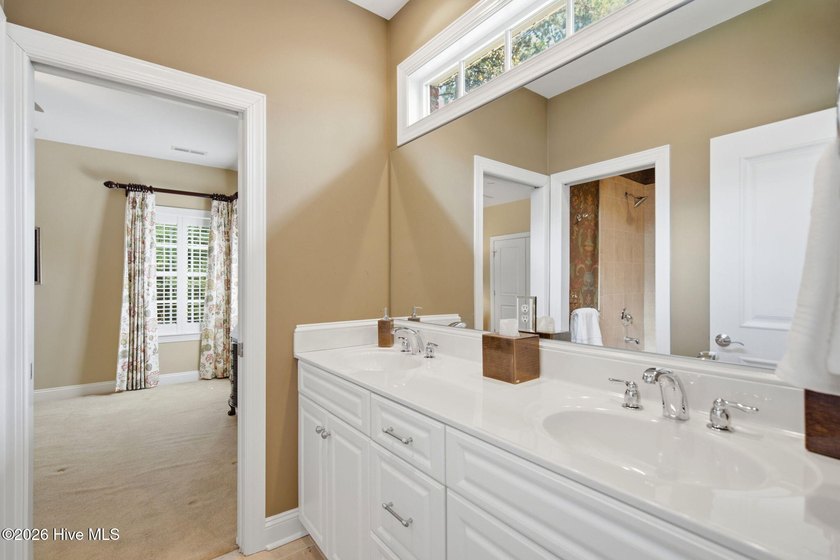 Welcome to 2118 Bay Colony Lane, an elegant 1.5-story brick - photo 33