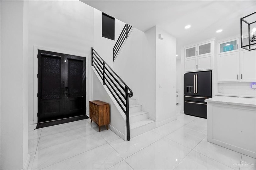 Located in the gated Los Lagos Golf Course community, this home - photo 4