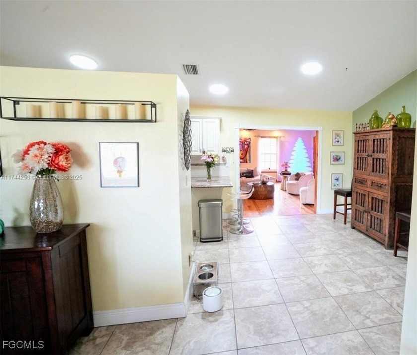 This inviting &amp; cozy 4-bedroom, 3-bathroom originally started as - photo 3