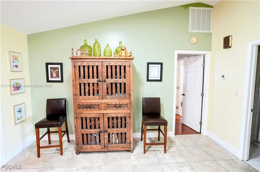 This inviting &amp; cozy 4-bedroom, 3-bathroom originally started as - photo 4