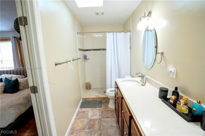 This inviting &amp; cozy 4-bedroom, 3-bathroom originally started as - photo 10