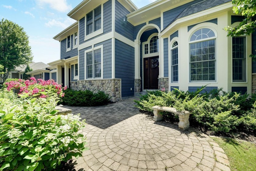 Welcome to 4270 Wild Meadows Drive, an exceptional two-story - photo 2