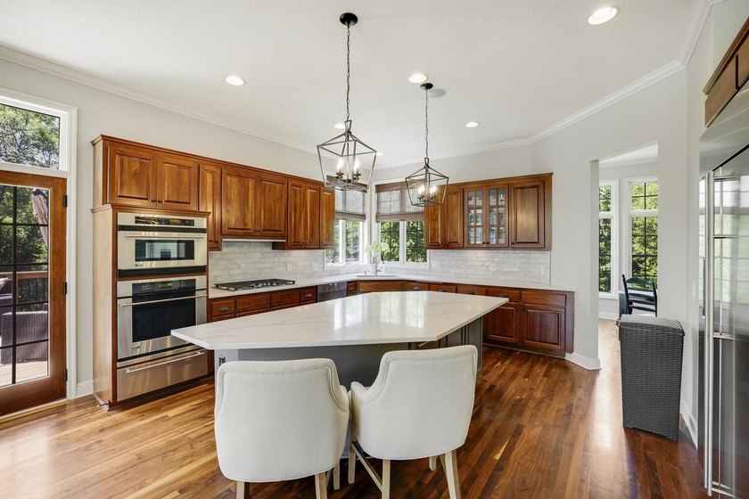 Welcome to 4270 Wild Meadows Drive, an exceptional two-story - photo 9