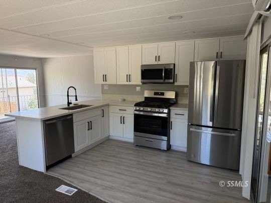 Tastefully Updated Remodel! Home has Gorgeous Shaker Cabinets - photo 5