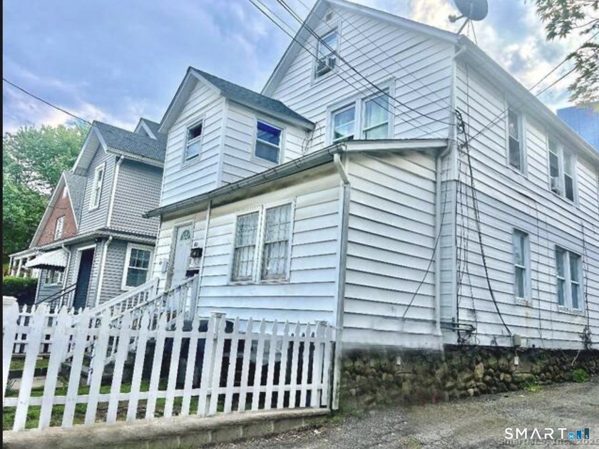 Rental Income $3,600 + $2,600. Cap Rate 7%+. Spacious Stamford 2 - photo 29