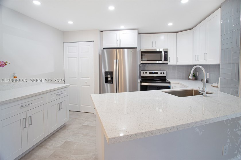 Experience resort-style 55+ living in this fully remodeled - photo 3