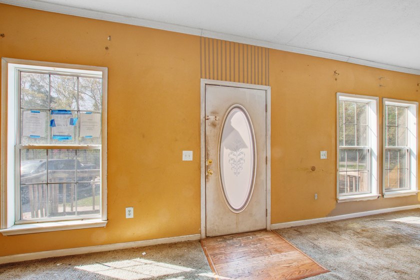 Three-bedroom, two-bath home situated on approximately 0.5 acres - photo 2