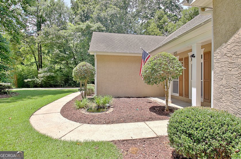 Welcome home to this spacious ranch situated on a private 1+ - photo 10