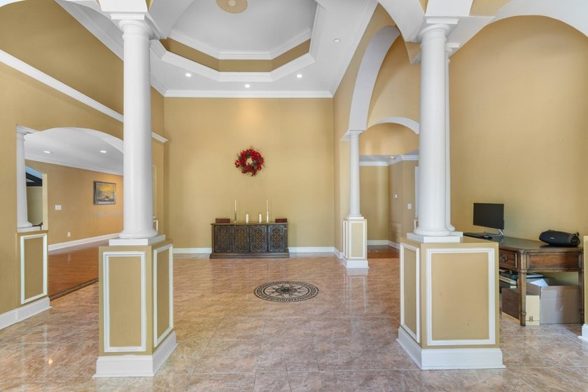 Tucked inside the sought-after golf course community of Coastal - photo 3