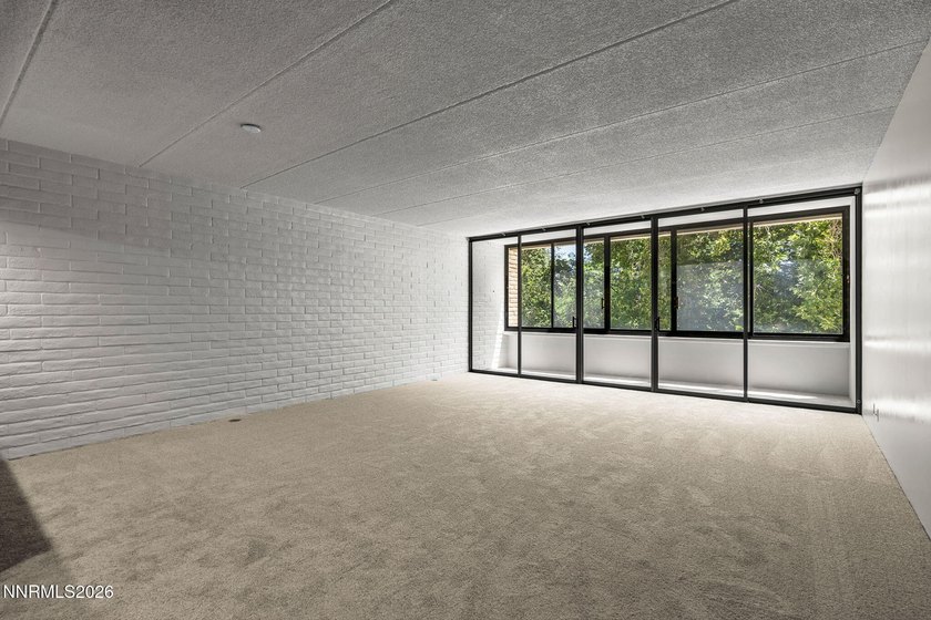 Elevated living along the Truckee River 4th-floor condo offering - photo 4